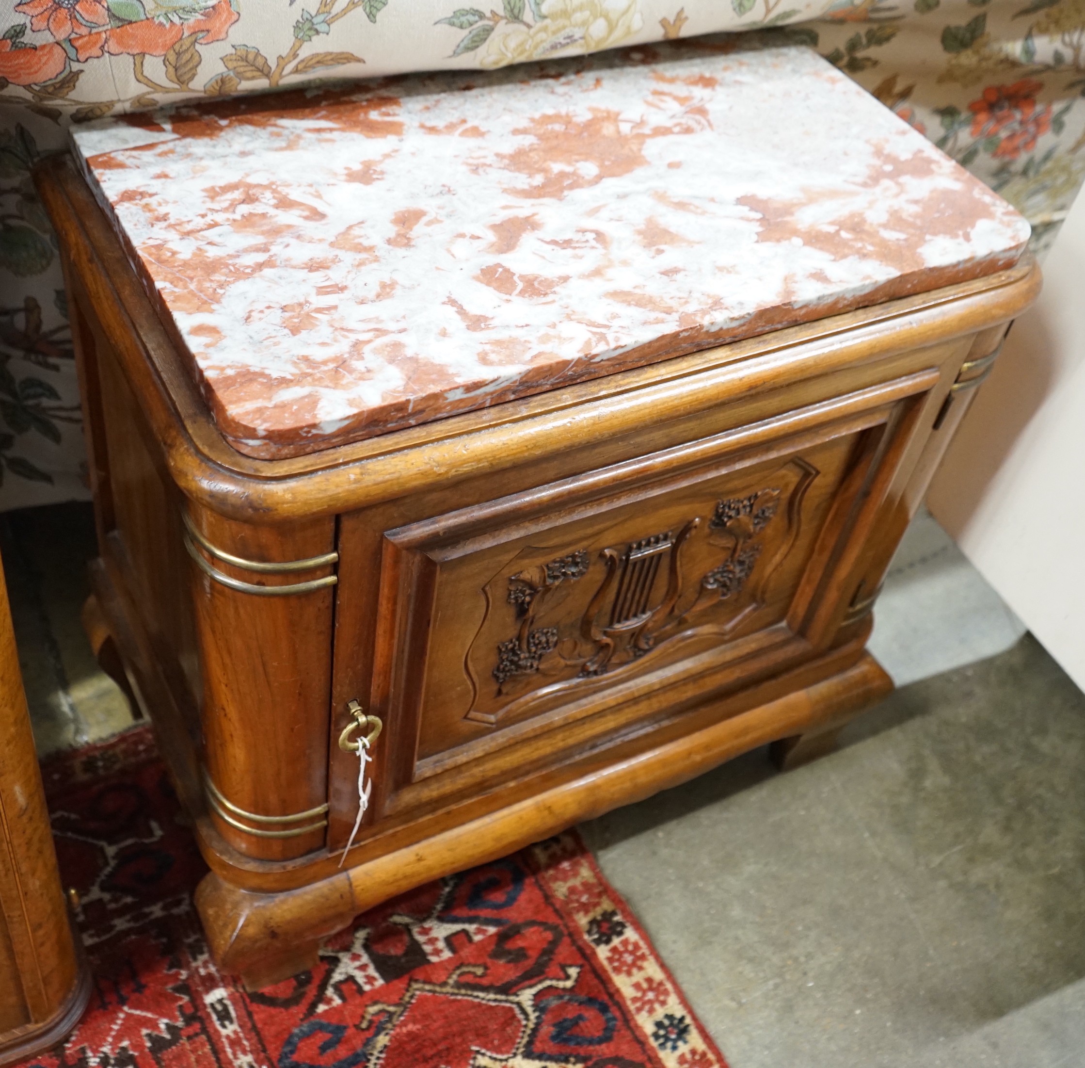 An early 20th century French marble topped carved walnut low cabinet, length 64cm, depth 35cm, height 61cm